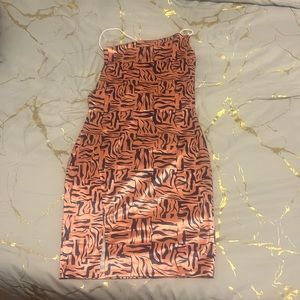 Peach and navy small dress.